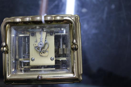 A 20th century French gilt brass repeating carriage clock by LEpee with moonphase dial and subsidiary calendar, month and day dials he